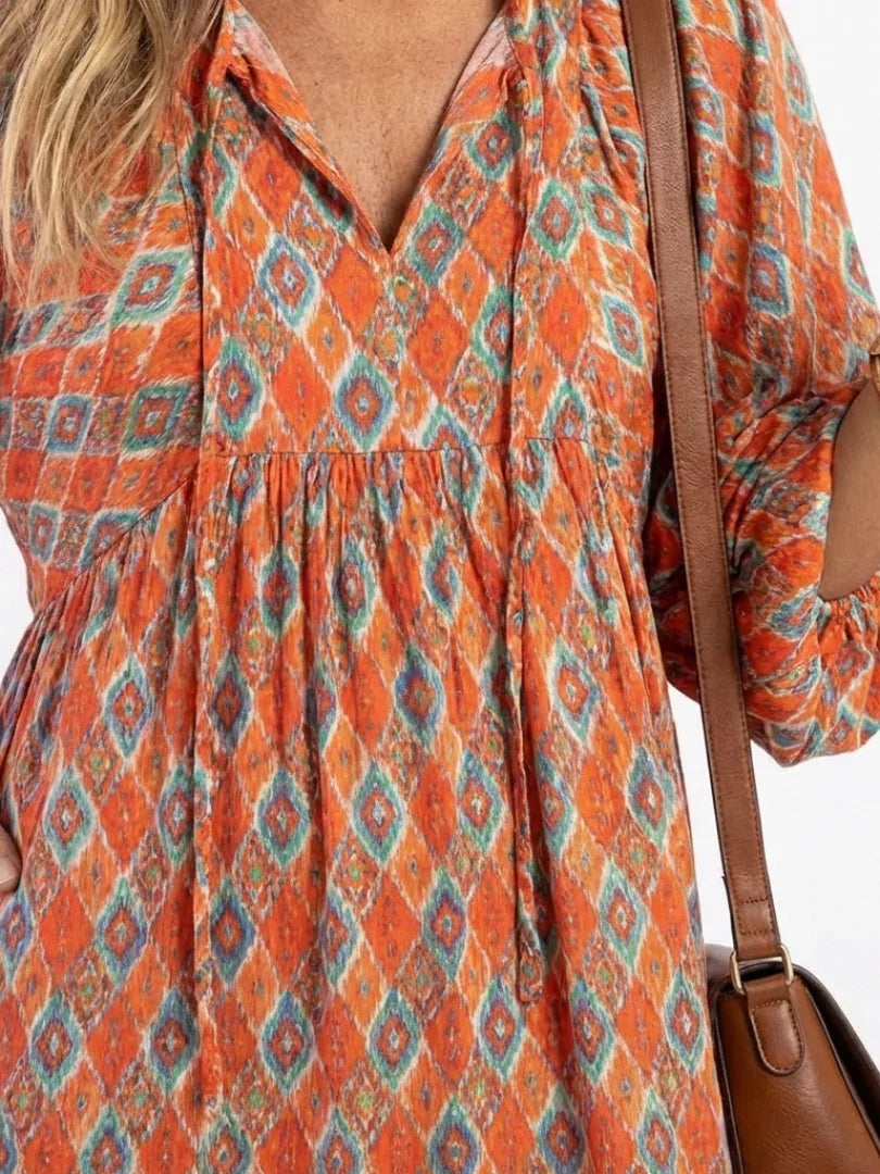 Daphne | V-Neck Geometric Print Tiered Midi Dress